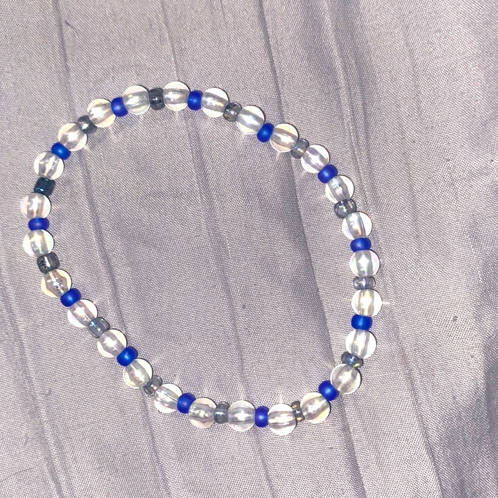 clear and blue bracelet